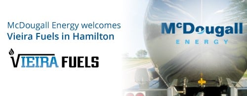 McDougall Energy acquires Vieira Fuels in Hamilton, Ontario 76 Shows back of a large chrome fuel truck with McDougall Energy logo and left of it is Vieira Fuels.