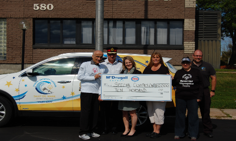 McDougall Energy and Esso Community Program Announce $10,000 Gold Level Sponsorship of the Ontario Special Olympics 182 Shows 6 people outside holding a large cheque from McDougall Energy