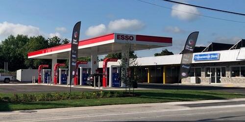 Shows exterior of Esso gas station