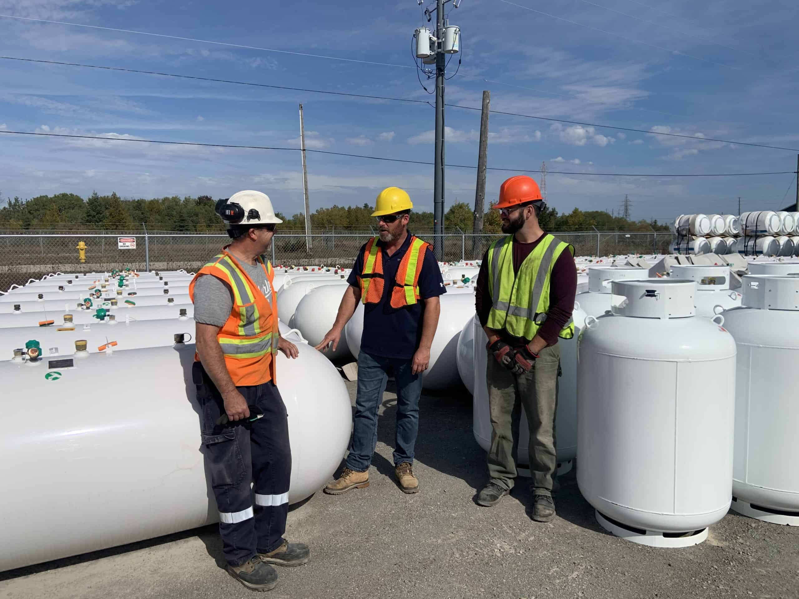 Propane tank storage and safety inspection at McDougall Energy facility.