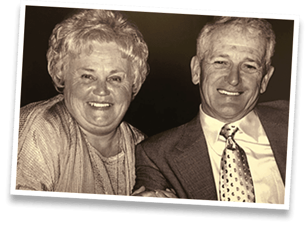 Warm smiling seniors enjoying energy services from McDougall Energy.